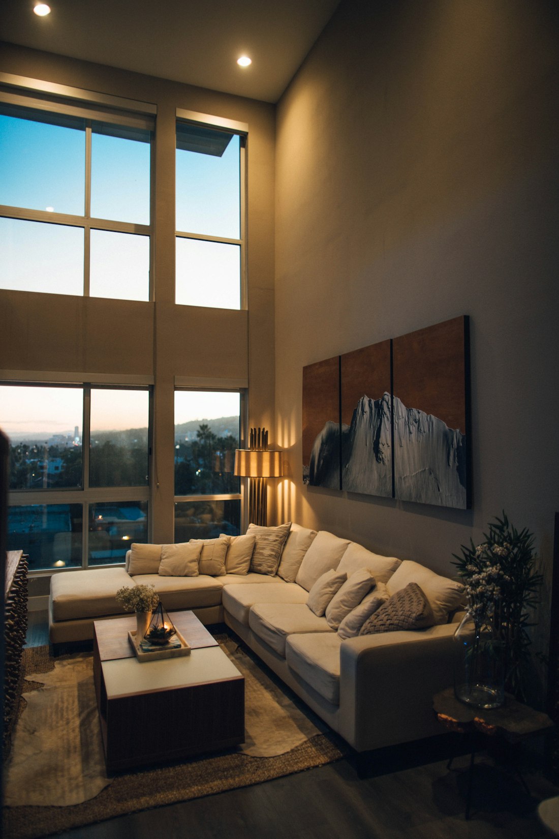 Warm modern living room at sunset
