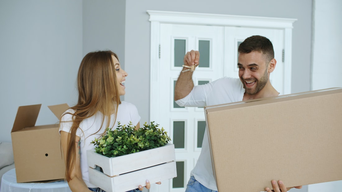 Couple celebrating the keys to their new home